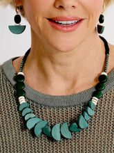CST15 - Painted wood, synthetic turquoise, hematite and clay