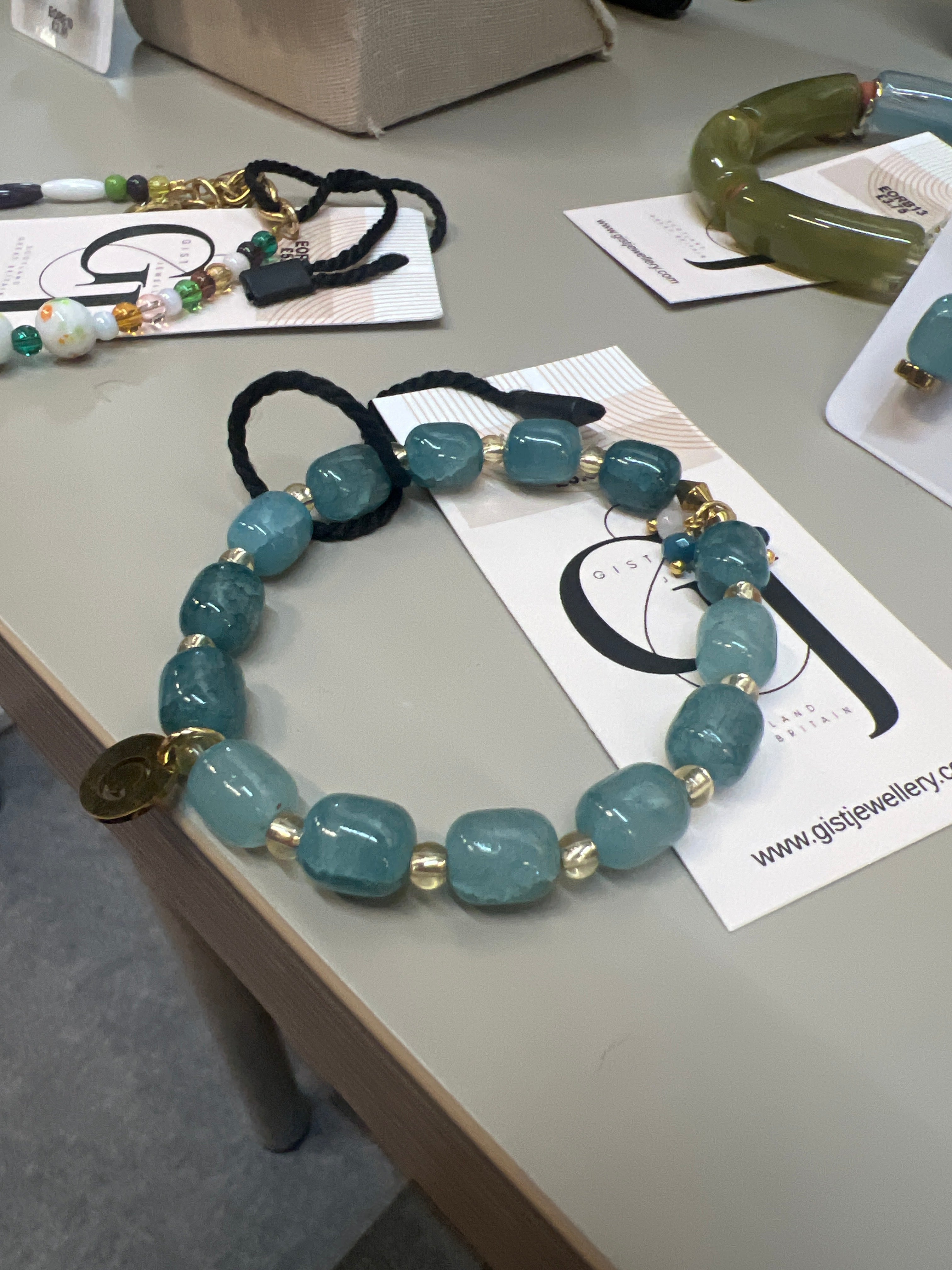 EORB09 - turquoise and multi coloured stretch bracelet