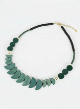 CST15 - Painted wood, synthetic turquoise, hematite and clay