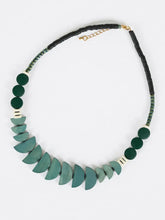 CST15 - Painted wood, synthetic turquoise, hematite and clay