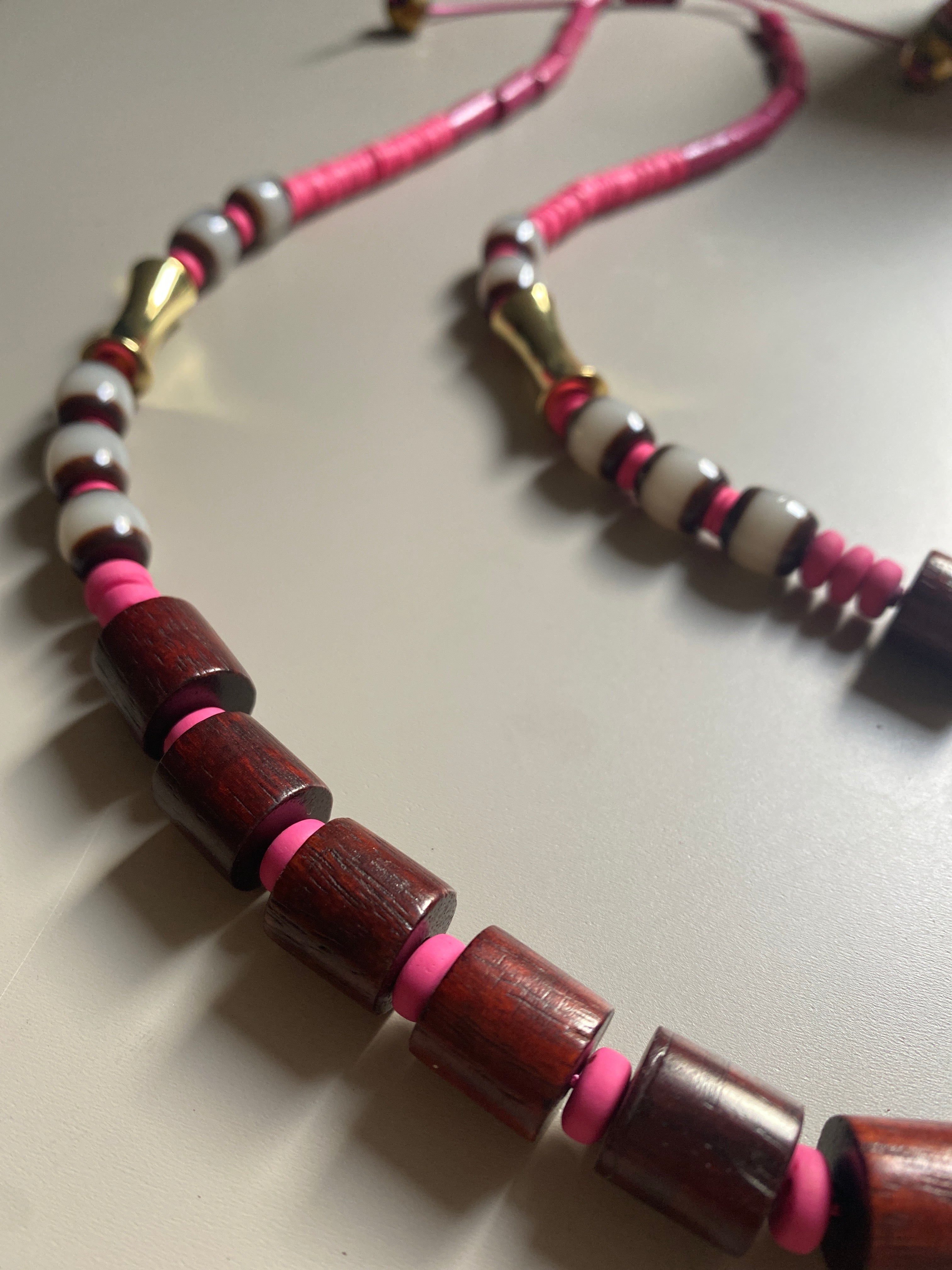 FRT11 - Adjustable cord necklace with dyed wood, clay, gold plated feature beads