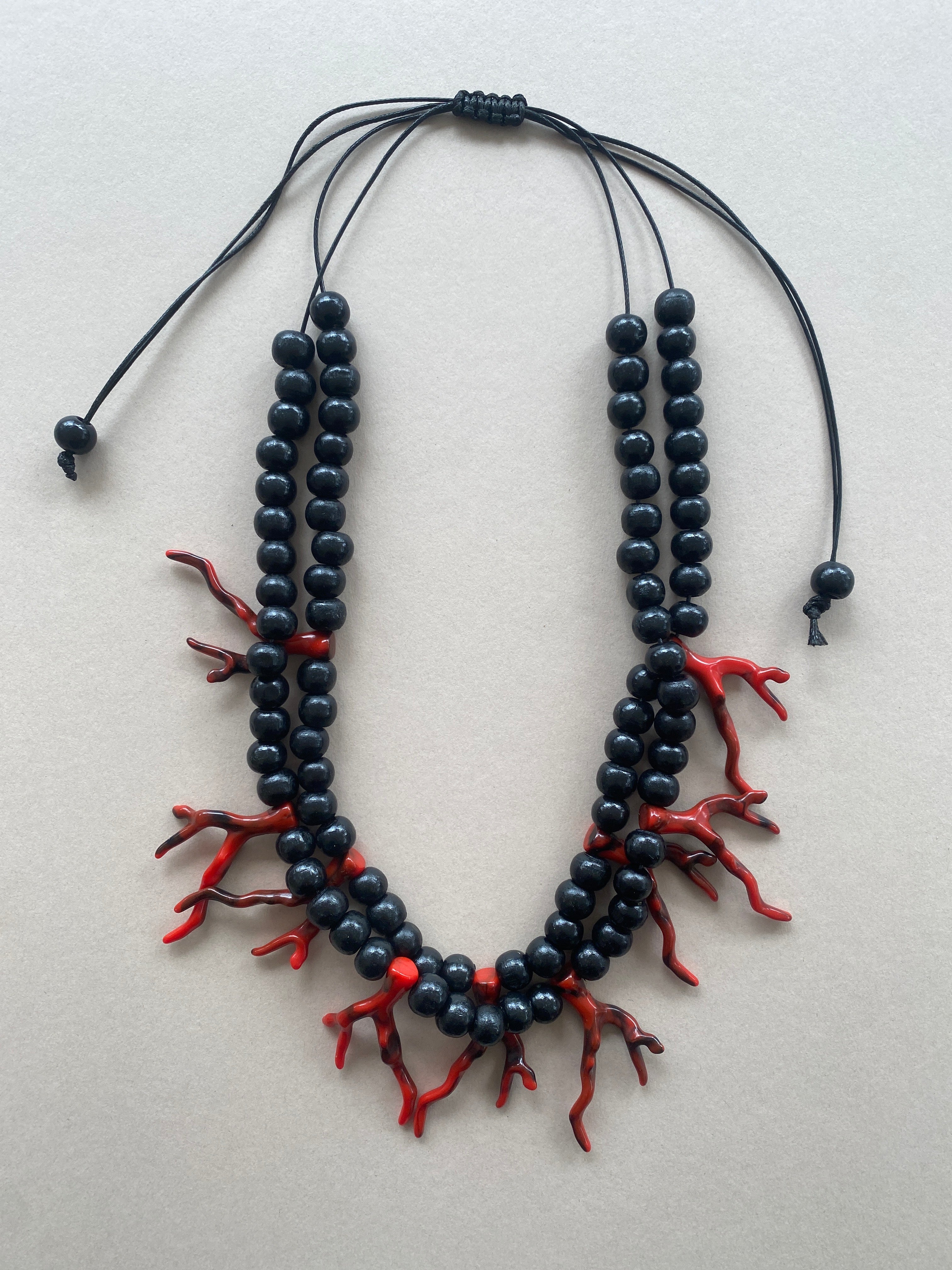 BDL12 - Adjustable red coral Resin and black wood double necklace