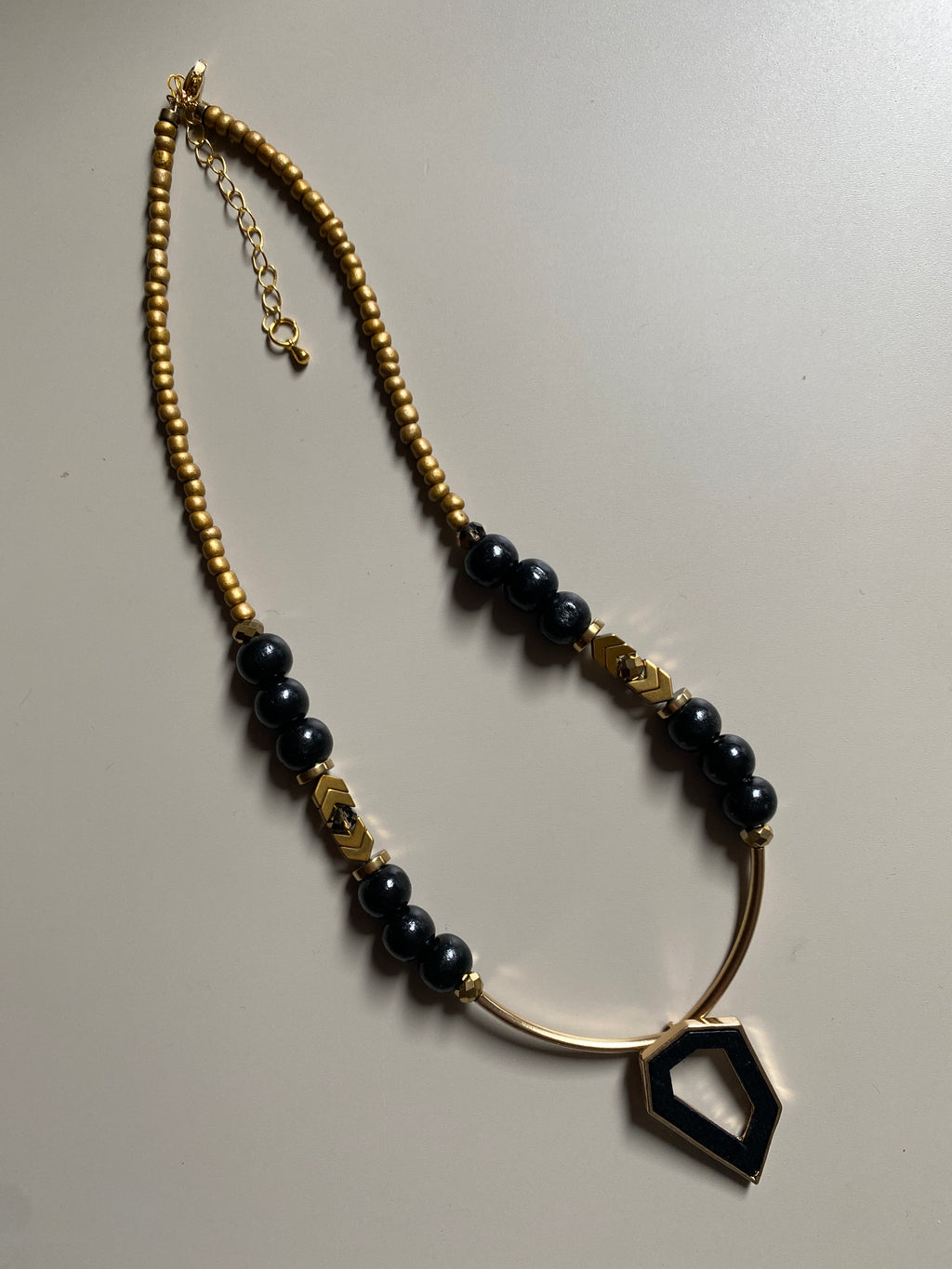FRT10 - Seed bead, painted wood, crystal, gold plated bars and Hematite necklace