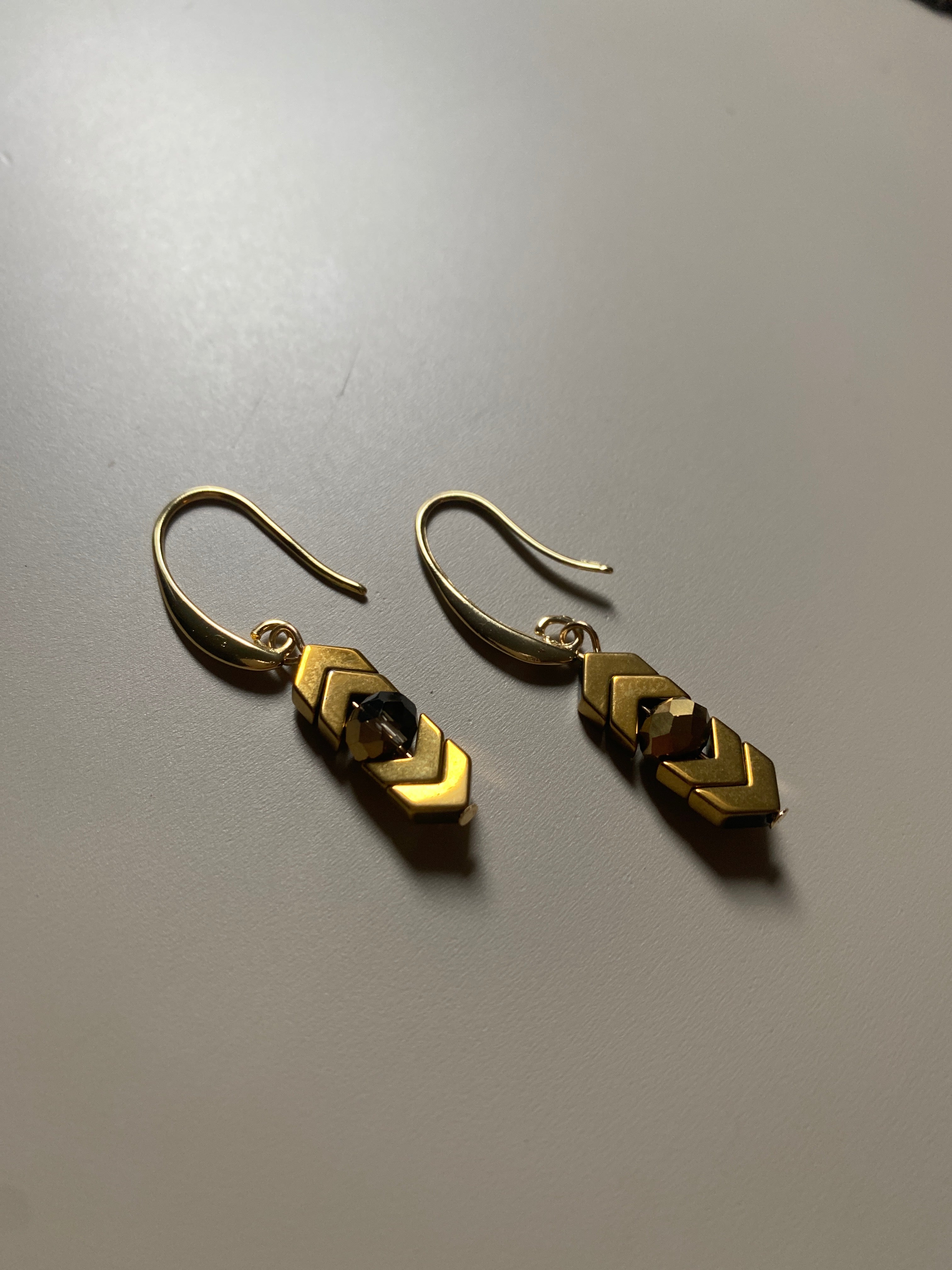 FRTE14 - Hematite and crystal drop earrings on a Gold plated hooks