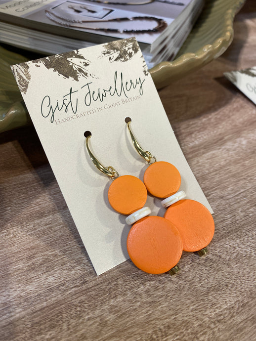 HILE16 - orange ivory disc earrings