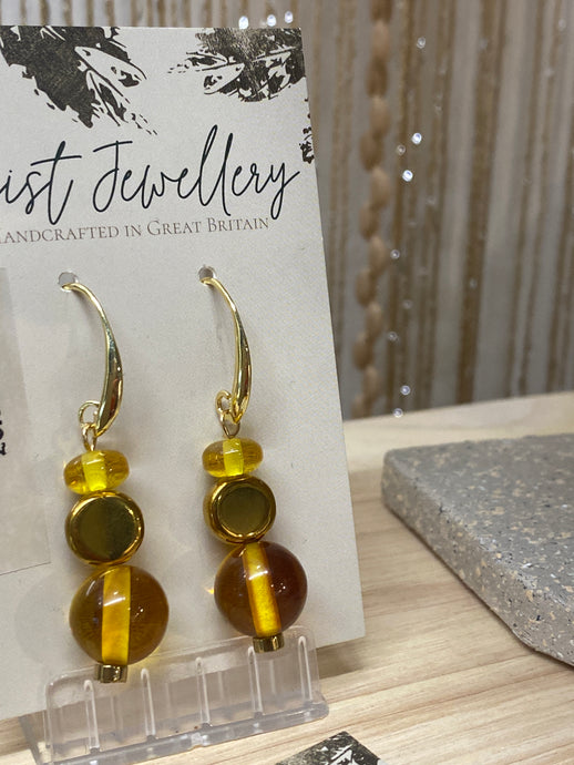 HILE09 - Honey yellow and hematite drop earrings