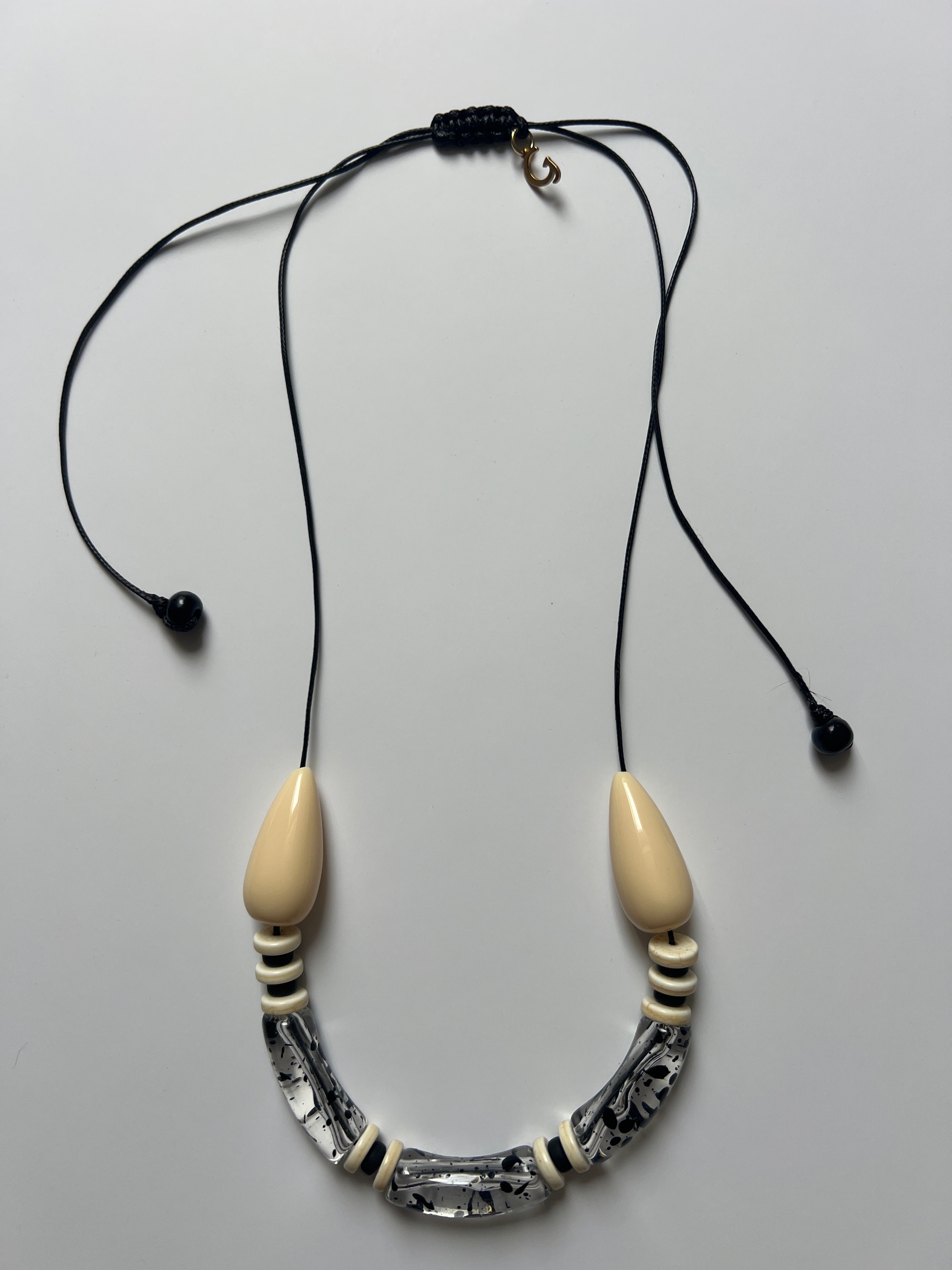 EOR05 - Translucent Clear , black adjustable cord necklace