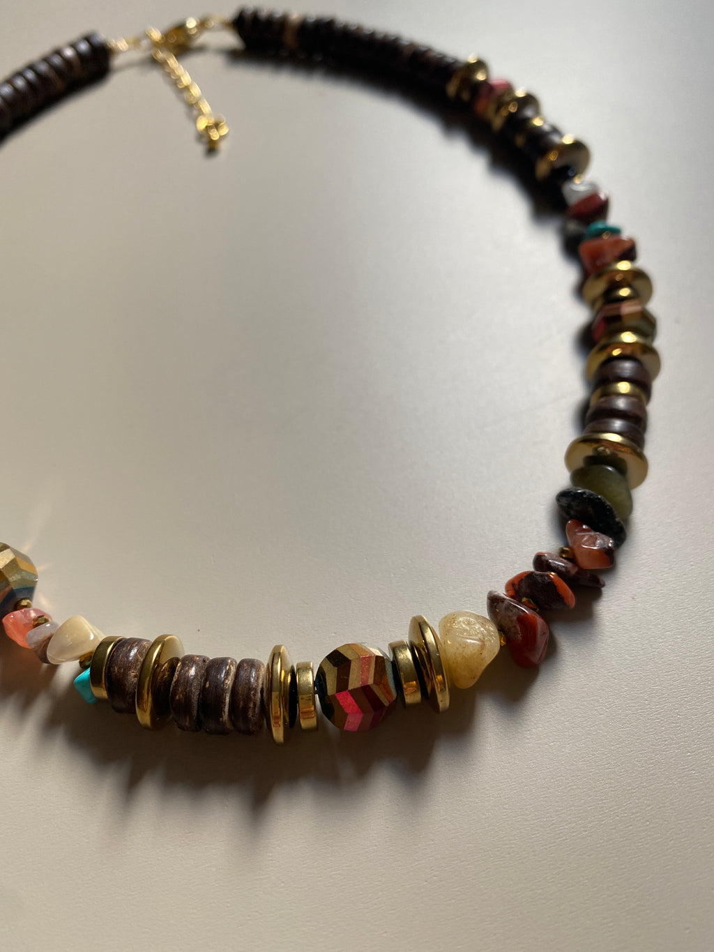 FRT08 - Coconut, Gold plated hematite, semi precious stone chips and crystal details make this 18" necklace