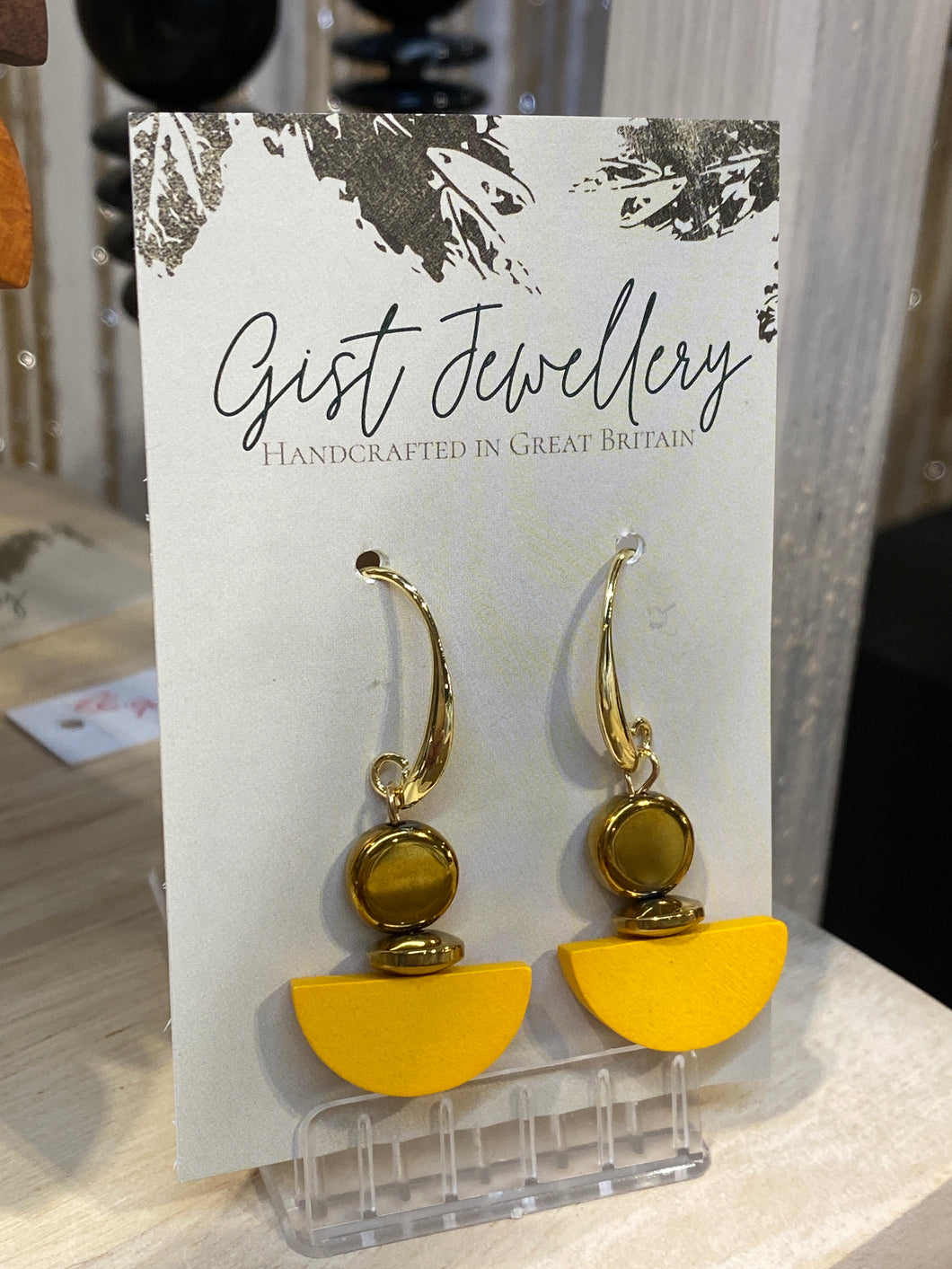 HILE21 - half yellow button earrings