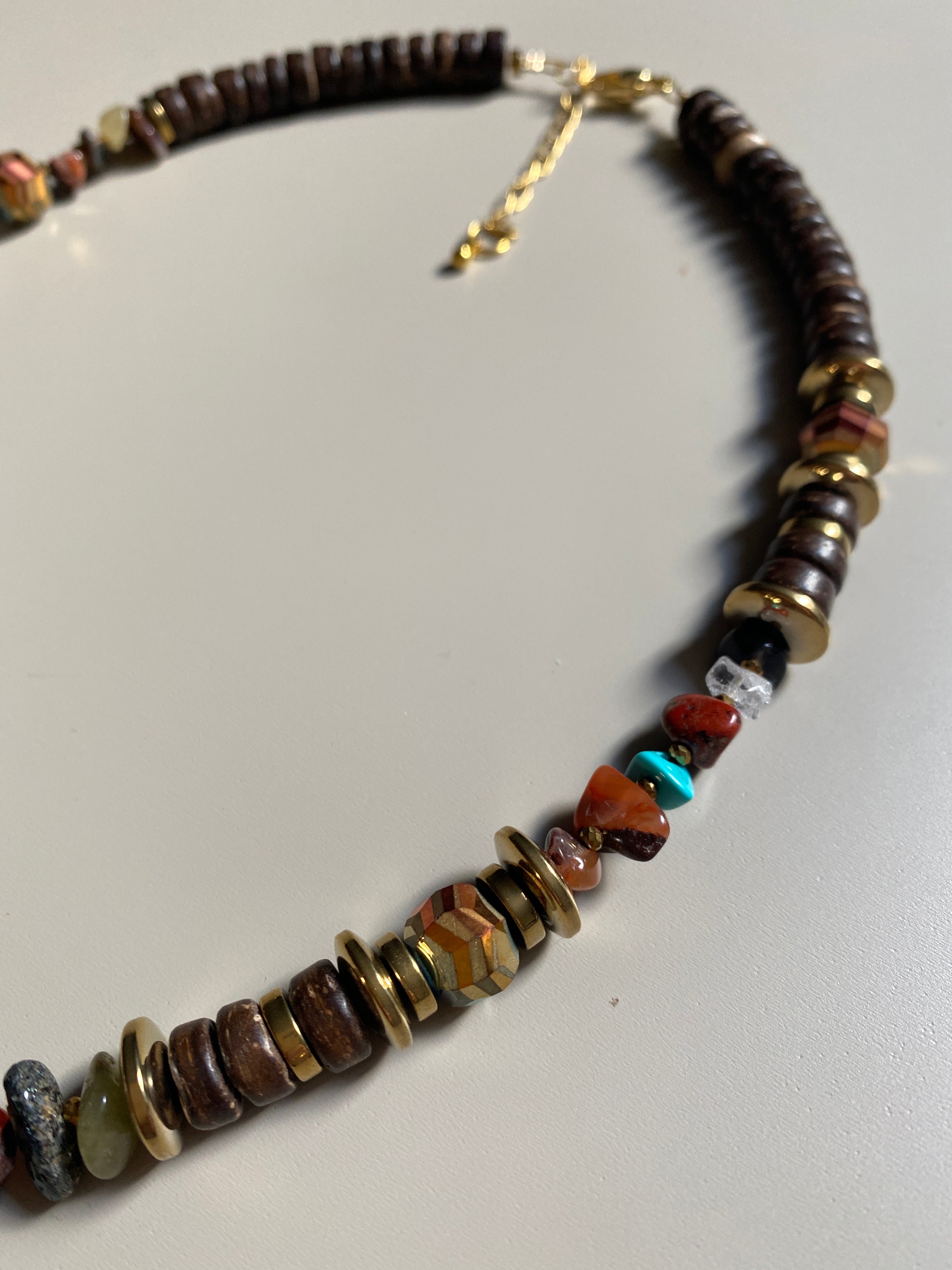 FRT08 - Coconut, Gold plated hematite, semi precious stone chips and crystal details make this 18" necklace