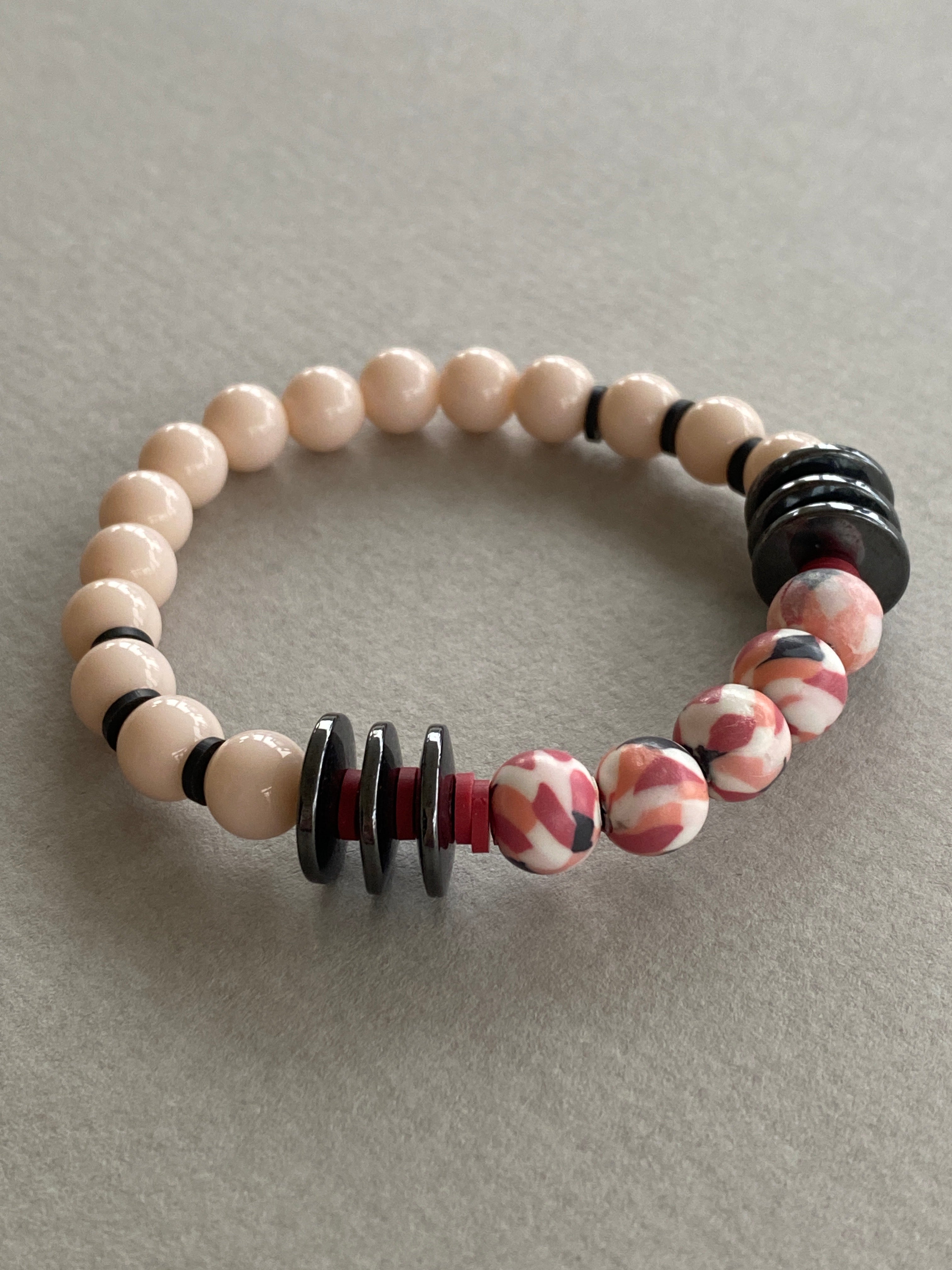 HILB02 - Peach Glass bracelet with red and black