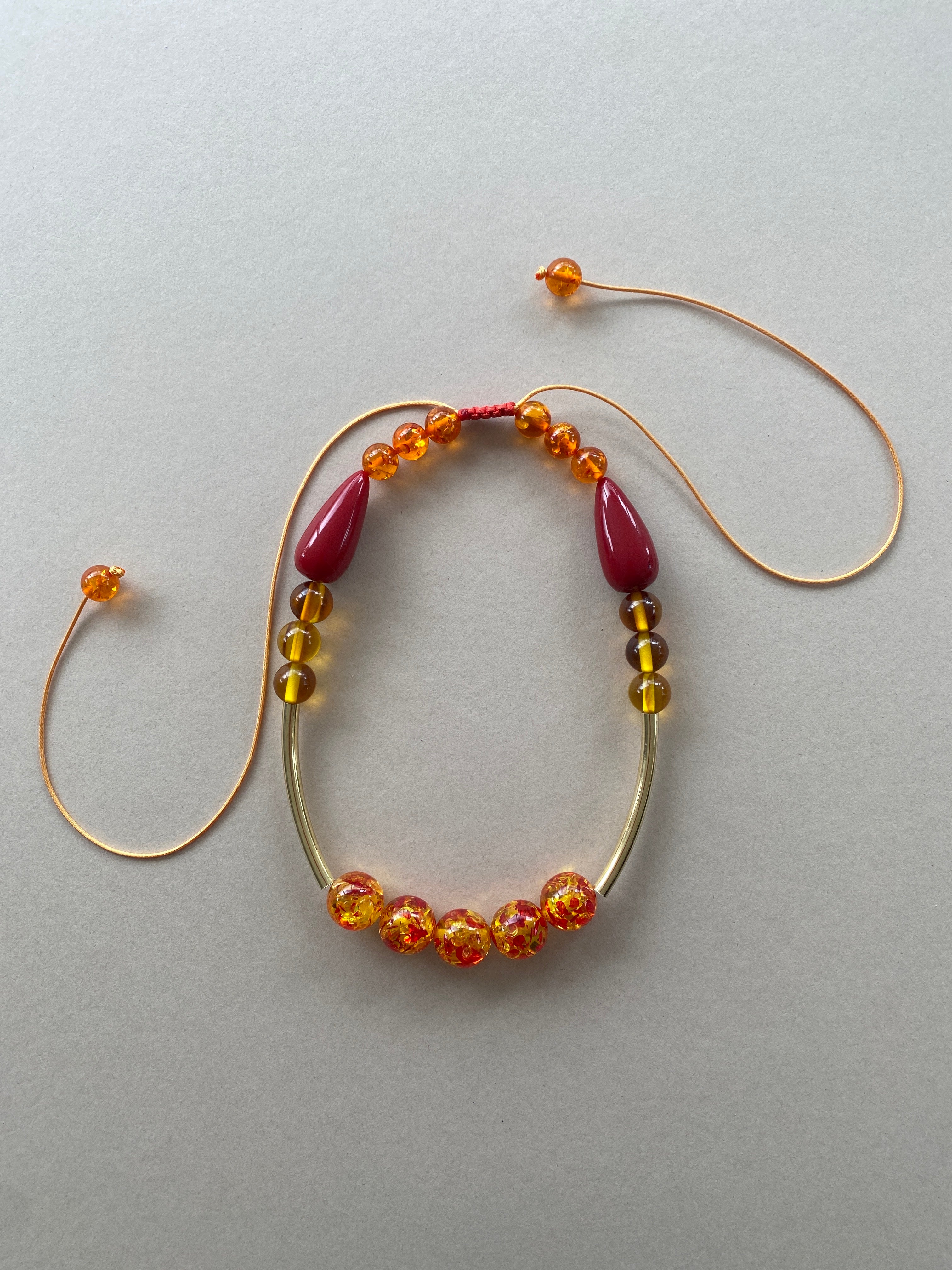 BDL21 - Yellow & red Resin adjustable cord necklace