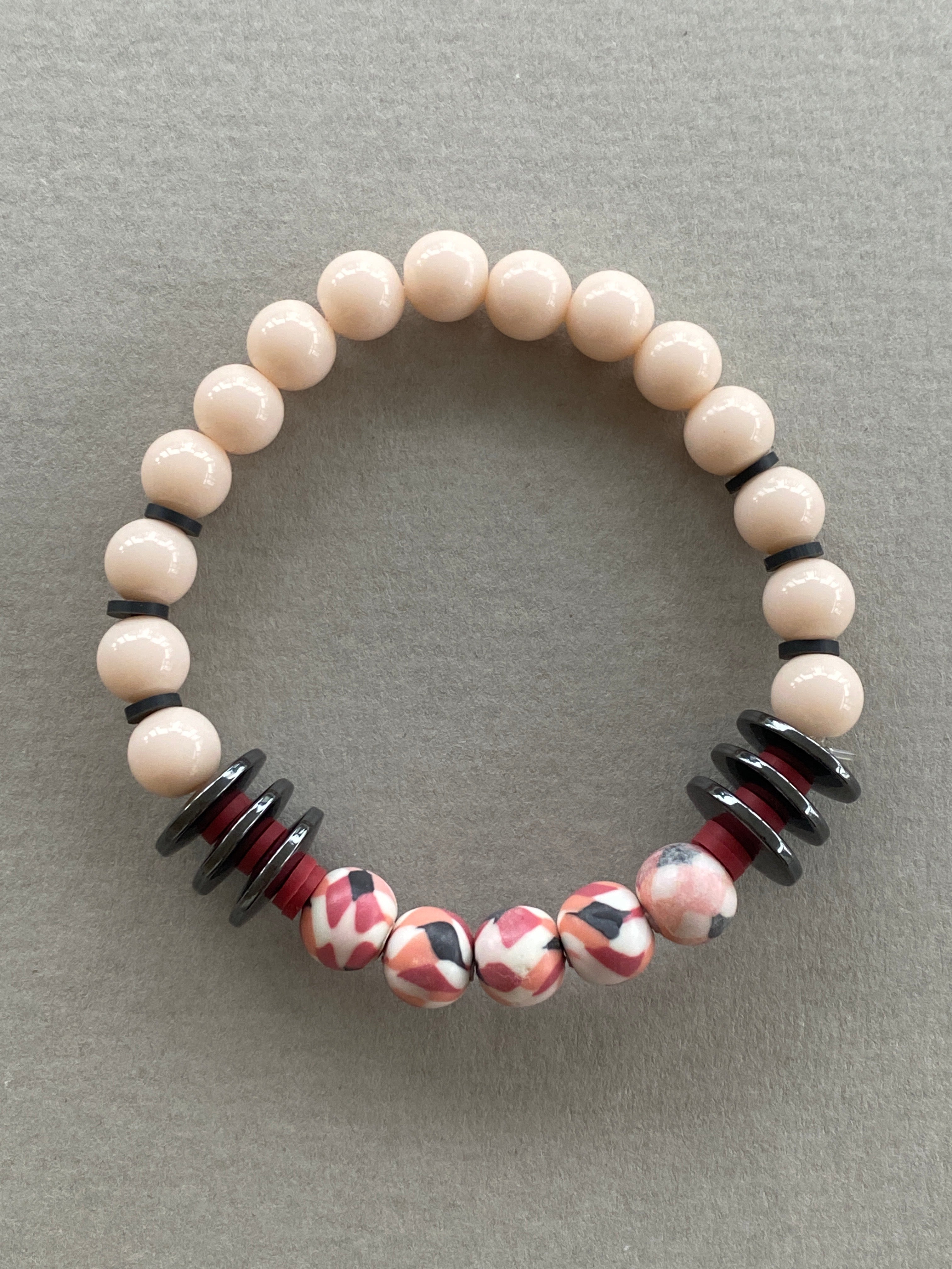 HILB02 - Peach Glass bracelet with red and black